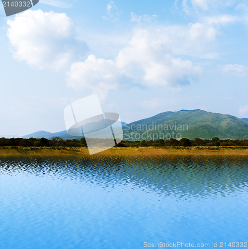 Image of seaview with beautiful clouds and mountains