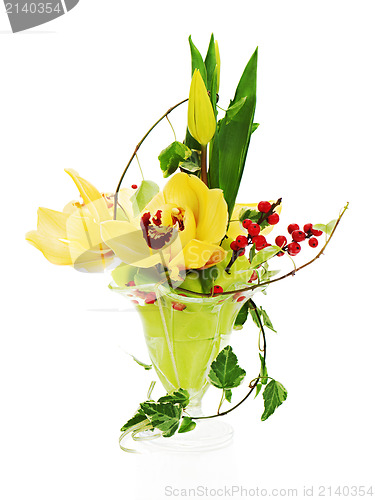 Image of bouquet from orchids, tulips and ivy arrangement centerpiece in 