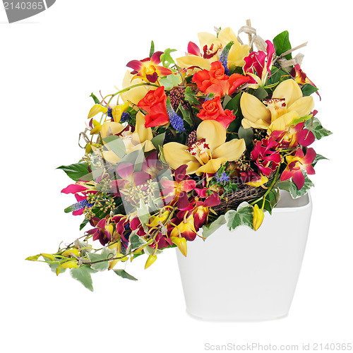 Image of colorful floral bouquet of roses, cloves and orchids arrangement