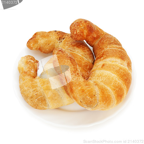 Image of fresh and tasty croissant on plate isolated on white background