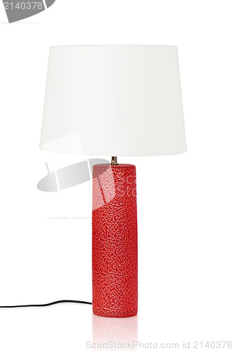 Image of red table lamp isolated on a white background
