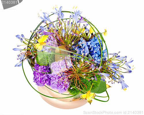 Image of colorful floral bouquet of roses, cloves and orchids arrangement