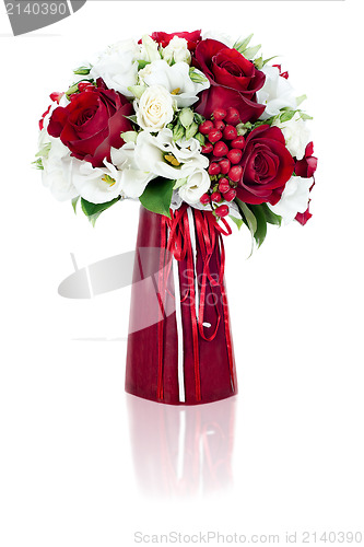 Image of colorful flower bouquet arrangement centerpiece in red vase isol