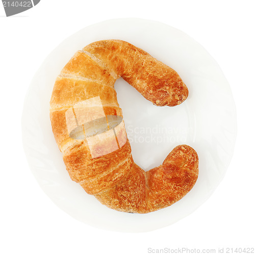 Image of fresh and tasty croissant on plate isolated on white background