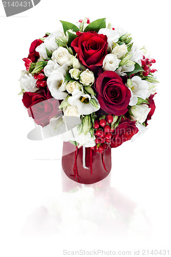 Image of colorful flower bouquet arrangement centerpiece in red vase isol