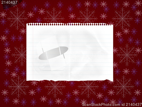 Image of sheet of paper on abstract red background with snowflakes