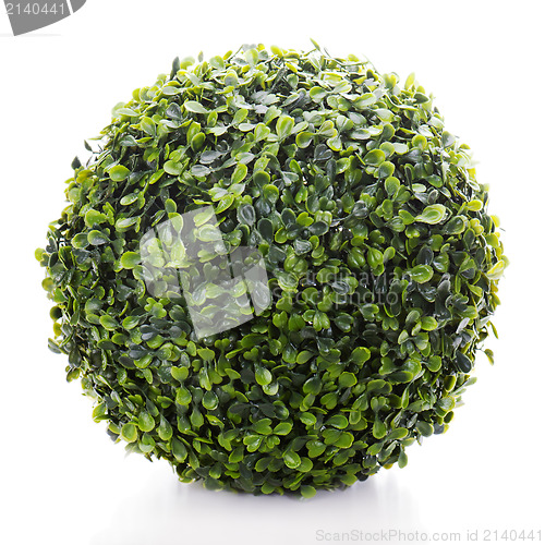 Image of  sphere from green artificial grass isolated on white background