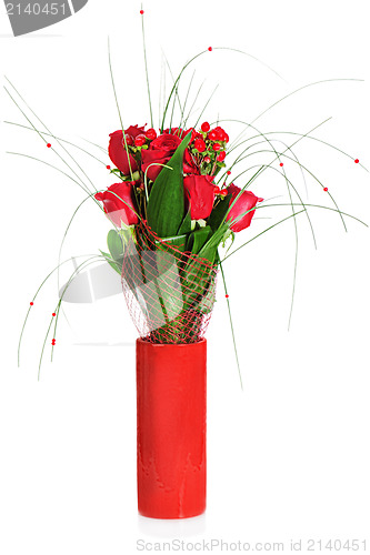 Image of colorful flower bouquet from red roses in red vase isolated on w