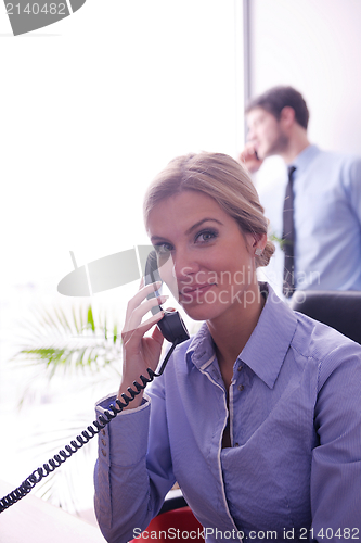 Image of business woman talk by phone