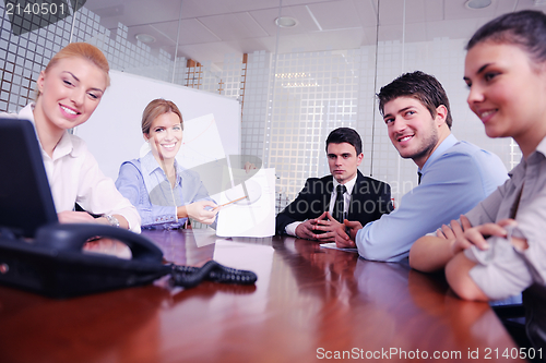 Image of business people in a video meeting