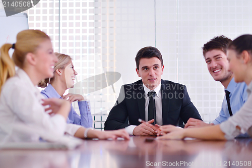 Image of business people in a meeting at office
