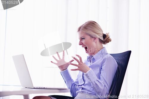Image of business woman at  office