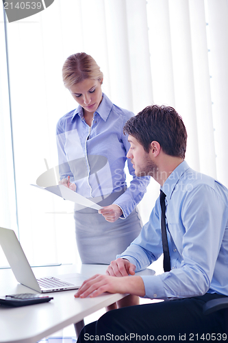 Image of business people in a meeting at office