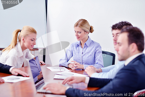 Image of business people in a meeting at office