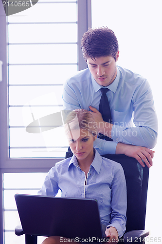 Image of business people in a meeting at office