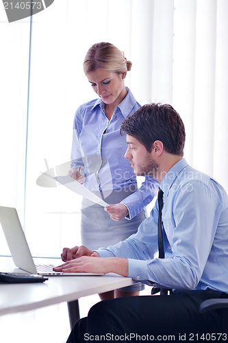 Image of business people in a meeting at office