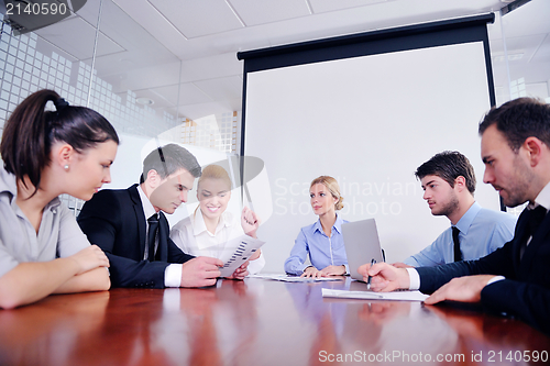 Image of business people in a meeting at office