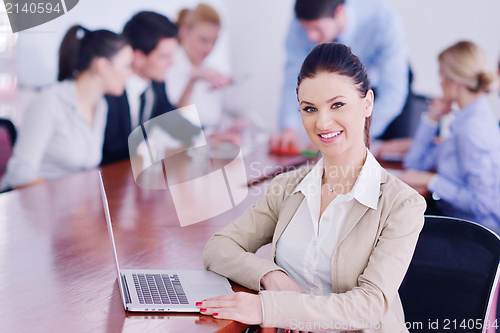 Image of business people in a meeting at office
