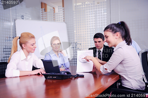 Image of business people in a video meeting