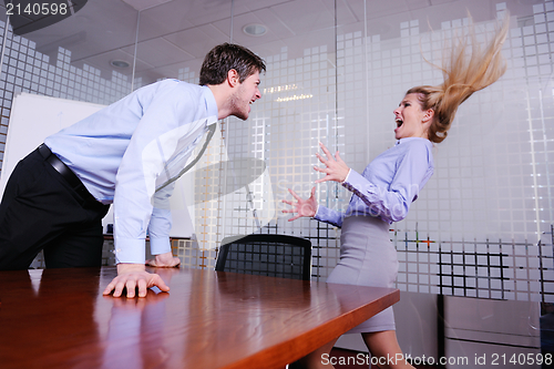 Image of Angry busines sman screaming at employee