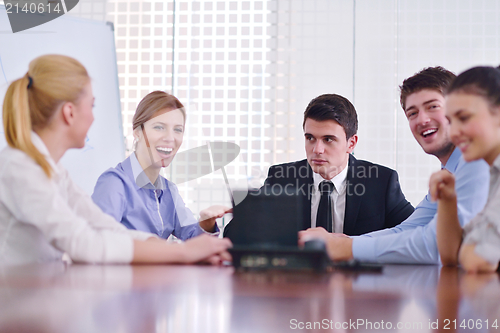 Image of business people in a meeting at office