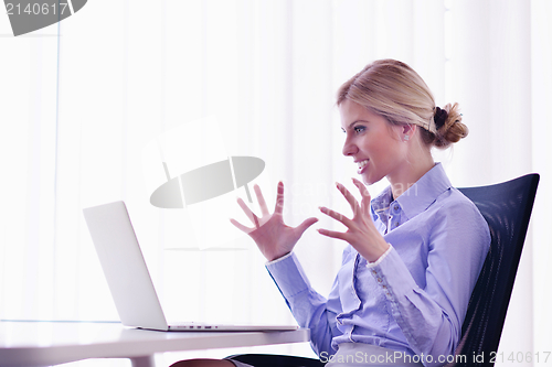 Image of business woman at  office