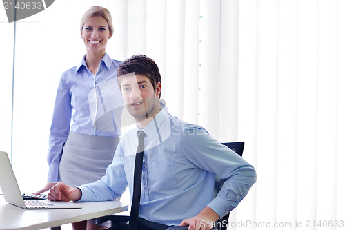 Image of business people in a meeting at office