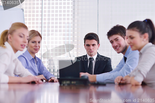 Image of business people in a meeting at office