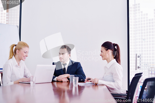 Image of business people in a meeting at office