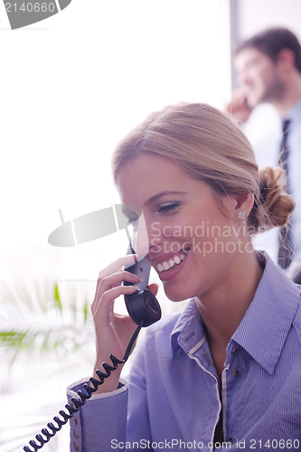 Image of business woman talk by phone