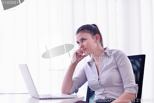 Image of business woman at  office