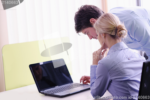 Image of business people in a meeting at office