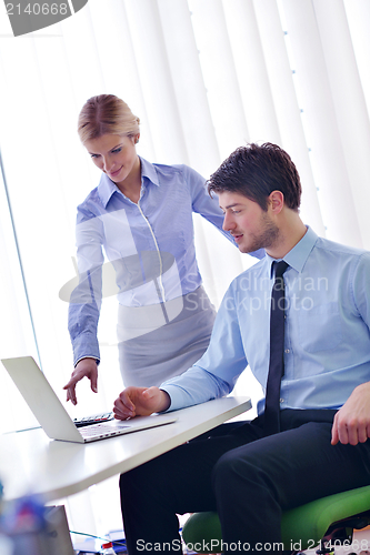 Image of business people in a meeting at office