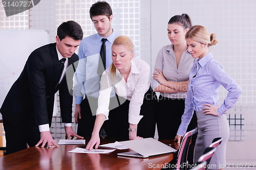 Image of business people in a meeting at office