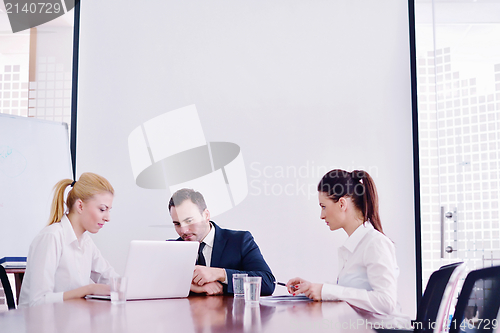 Image of business people in a meeting at office