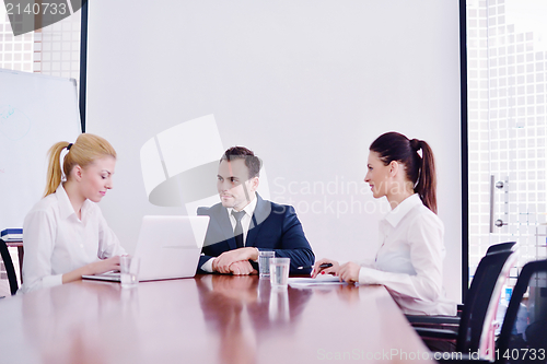 Image of business people in a meeting at office