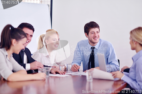 Image of business people in a meeting at office