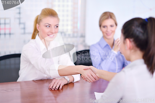 Image of business people in a meeting at office