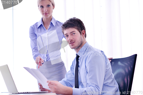 Image of business people in a meeting at office