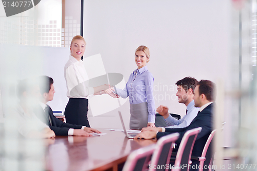 Image of business people in a meeting at office