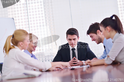 Image of business people in a meeting at office