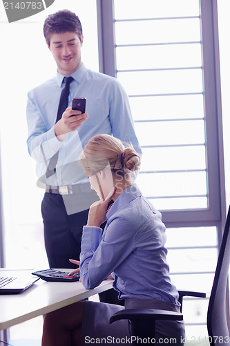 Image of business people in a meeting at office