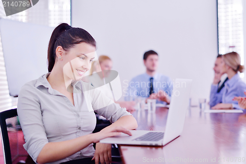Image of business people in a meeting at office