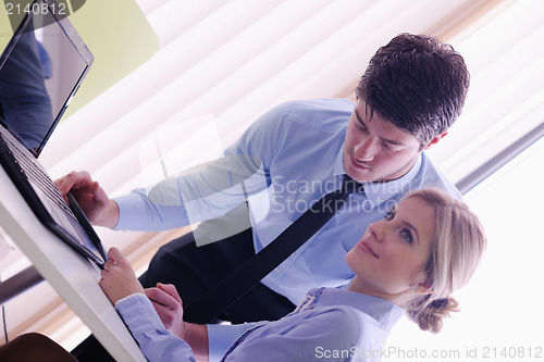 Image of business people in a meeting at office