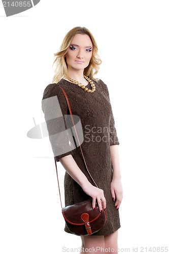 Image of woman in a brown dress. Isolated