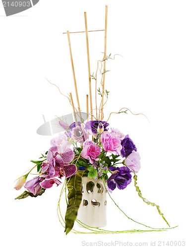 Image of colorful floral bouquet of roses, lilies and orchids arrangement