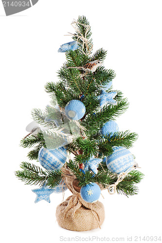 Image of Christmas fir tree decorated with toys and Christmas decorations