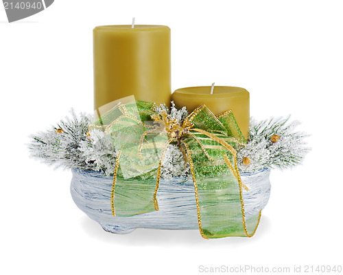 Image of Christmas composition of two candles, ornaments and pine branche