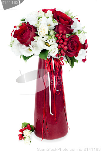 Image of colorful flower bouquet arrangement centerpiece in red vase isol