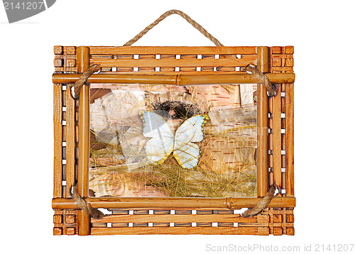 Image of bamboo photo frame with abstract composition of butterflies, bir